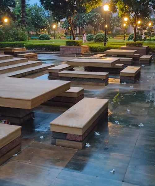 Amidst lush greenery and softly glowing lights, this serene outdoor seating area offers the perfect spot to unwind, reflect, and soak in nature’s calm. Whether after a gentle evening walk or a quiet morning, it’s a peaceful escape right at your doorstep.